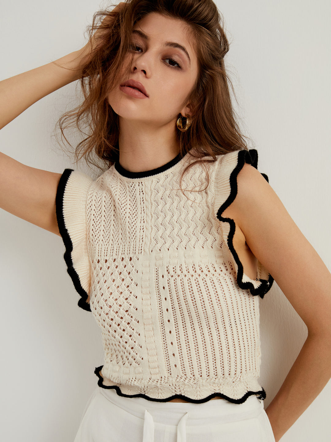 Maelis - Sleeveless Ruffle Top